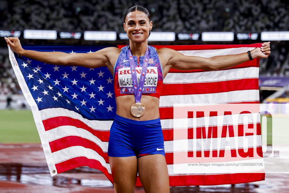 Winner Sydney Mclaughlin-Levrone of United States of America showing her gold medal and celebrating and holding flag after competing in the Women s 400 Metres Final during World Athletics Championships Tokyo 2025 of the Day 6 at Japan National Stadium on September 18, 2025 in Tokyo, Japan. (Photo by Marcel ter Bals DeFodi Images)
