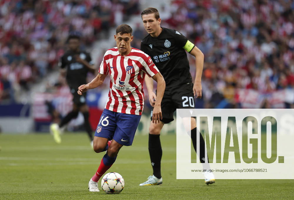 Atletico Madrid v Club Brugge - UEFA Champions League MADRID, SPAIN - OCTOBER 12: Club Brugge s player Hans Vanaken (R) in action against Nahuel Molina (16) of Atletico Madrid during the UEFA Champions League Group B football match between Atletico Madrid and Club Brugge at Civitas Metropolitano Stadium in Madrid, Spain on October 12, 2022. Madrid Spain. Editorial use only. Please get in touch for any other usage.