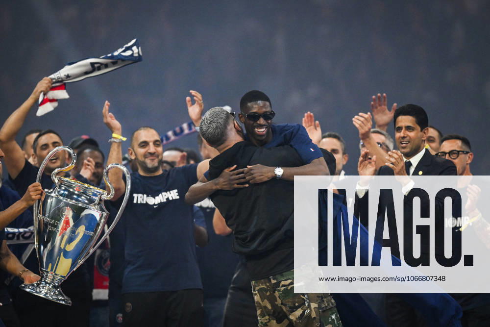 PSG celebrates Champions League trophy at Parc des Princes - FA DJ Snake hugs Paris Saint-Germain’s forward Ousmane Dembele as Paris Saint-Germain’s players celebrate the UEFA Champions League trophy at the Parc des Princes Stadium in Paris on June 1, 2025, the day after PSG won the UEFA Champions League final football match over Inter Milan in Munich, on May 31, 2025. Photo by Firas Abdullah ABACAPRESS.COM Paris Ile-de-France France