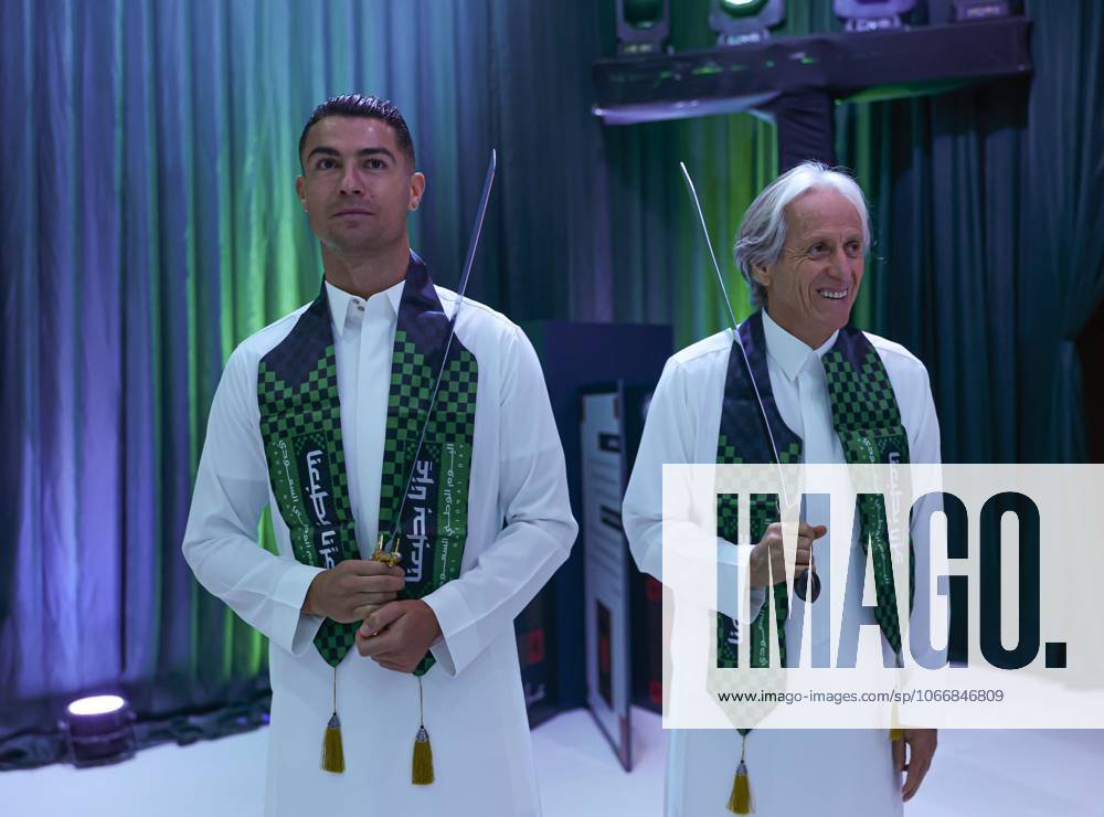 Ronaldo performs sword dance during Saudi Arabia’s National Day celebrations RIYADH, SAUDI ARABIA - SEPTEMBER 23: (---- - MANDATORY CREDIT - AL NASSR SAUDI CLUB HANDOUT - NO MARKETING NO ADVERTISING CAMPAIGNS - DISTRIBUTED AS A SERVICE TO CLIENTS----) Head coach Jorge Jesus (R) and Portuguese football star Cristiano Ronaldo (L) of Saudi Club Al Nassr attend the Saudi Arabia’s National Day on Sept. 23, in Riyadh, Saudi Arabia on September 23, 2025. Al Nassr Saudi Club Handout Anadolu Riyadh Saudi Arabia. Editorial use only. Please get in touch for any other usage.