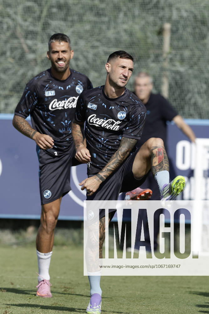 Training session SSC Napoli Napoli s Italian defender Leonardo Spinazzola and Napoli s Italian forward Matteo Politano during the final training session before the UEFA Champions League match against Sporting Clube de Portugal at the SSC Napoli Training Centre on 30 September 2025 in Castel Volturno, Italy. _BPH8260