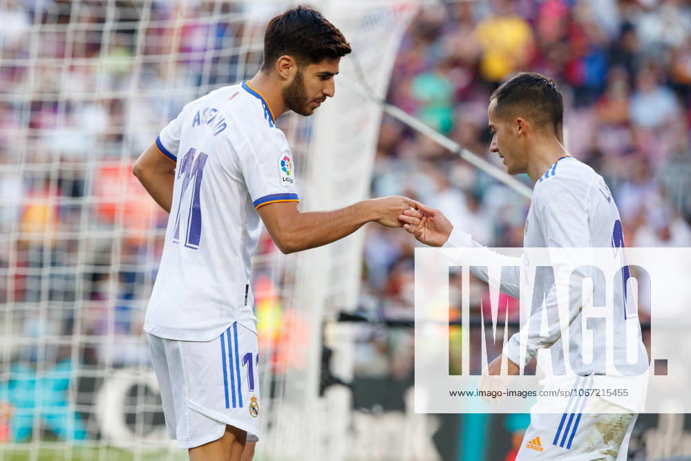 FC Barcelona, Barca v Real Madrid CF - La Liga Santander BARCELONA, SPAIN - OCTOBER 24: Lucas Vazquez of Real Madrid (R) after scoring a goal with Marco Asensio of Real Madrid (L) during the La Liga match between FC Barcelona and Real Madrid at Camp Nou in Barcelona on October 24, 2021 Catalonia Spain. Editorial use only. Please get in touch for any other usage.