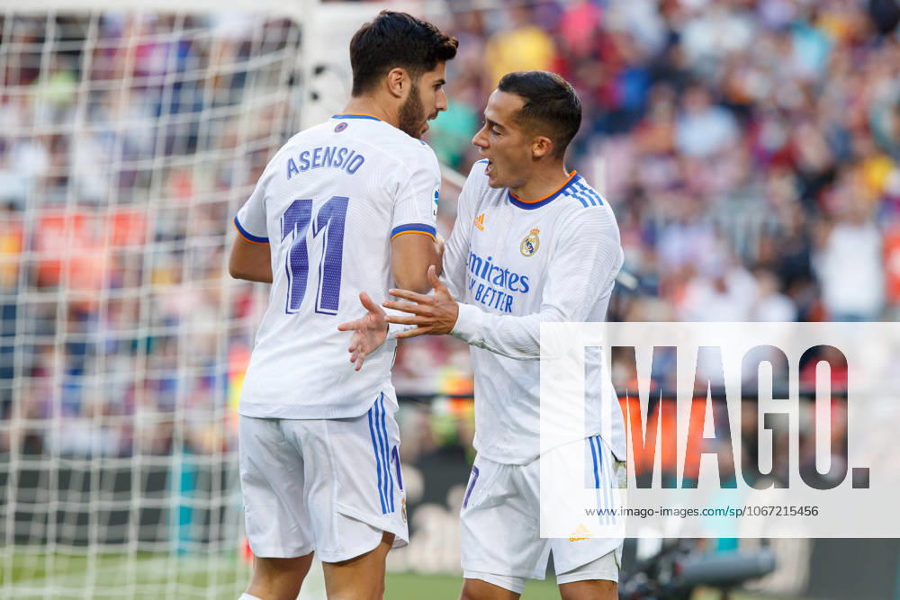 FC Barcelona, Barca v Real Madrid CF - La Liga Santander BARCELONA, SPAIN - OCTOBER 24: Lucas Vazquez of Real Madrid (R) after scoring a goal with Marco Asensio of Real Madrid (L) during the La Liga match between FC Barcelona and Real Madrid at Camp Nou in Barcelona on October 24, 2021 Catalonia Spain. Editorial use only. Please get in touch for any other usage.