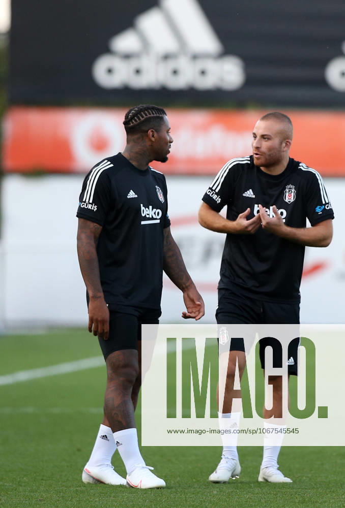 Besiktas training session ahead of UEFA Europa League match against Portugal s Rio Ave ISTANBUL, TURKEY - SEPTEMBER 23 : Gokhan Tore (R) and Lens (L) of Besiktas attend a training session led by Besiktas assistant coach Murat Sahin ahead of the UEFA Europa League 3rd qualifying round match against Portugal s Rio Ave at Besiktas Nevzat Demir Facilities in Istanbul, Turkey on September 23, 2020. Istanbul Turkey. Editorial use only. Please get in touch for any other usage.