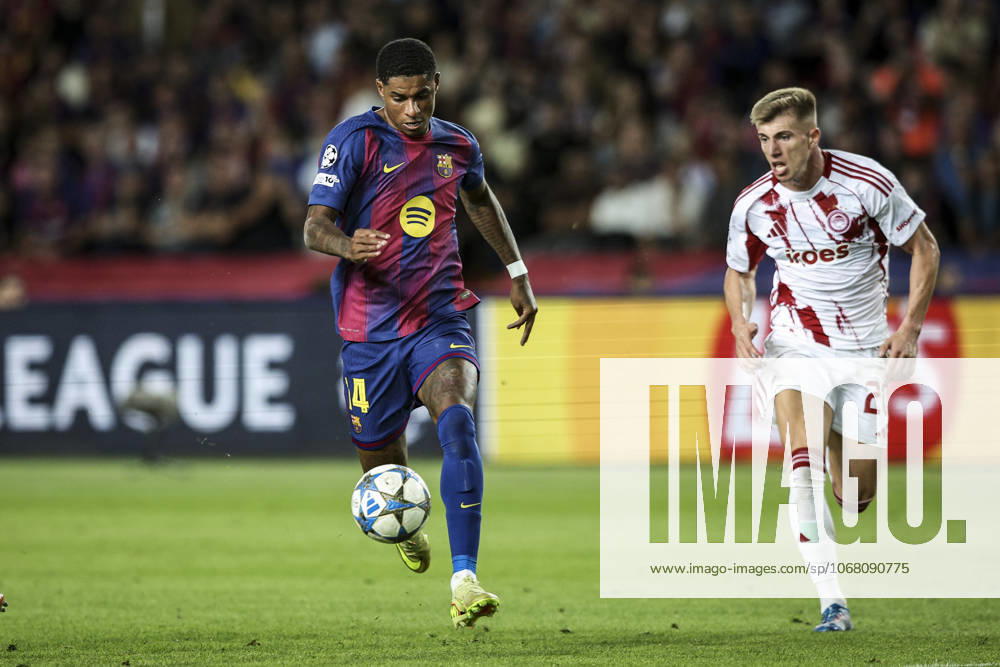 FC Barcelona, Barca v Olympiacos FC - UEFA Champions League 2025 26 League Phase MD3 Marcus Rashford of FC Barcelona controls the ball while being defended by an Olympiacos player during the UEFA Champions League 2025 26 League match between FC Barcelona and Olympiacos FC at Estadi Olimpic Lluis Companys in Barcelona, Spain, on October 21, 2025. Barcelona Spain