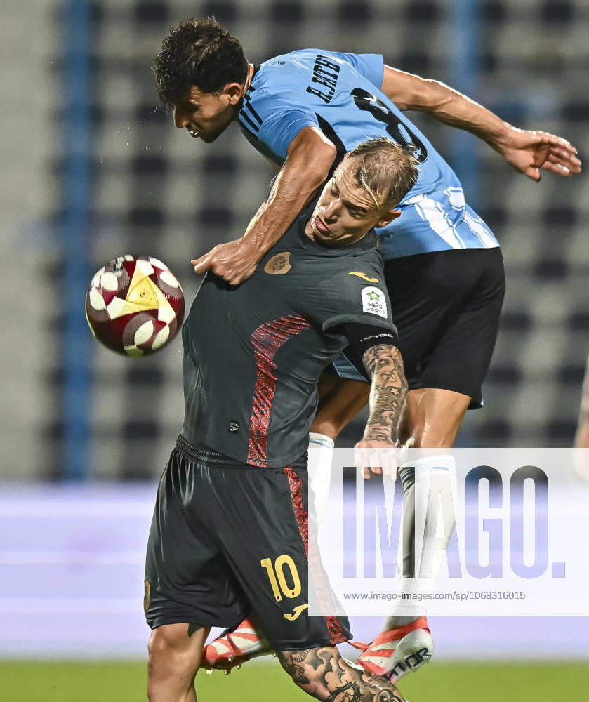 AL WAKRAH SC V AL RAYYAN SC-DOHA BANK STARS LEAGUE QATAR Hamdy Fathy Abdel Fattah (R) of Al-Wakrah SC and Roger Krug Guedes of Al Rayyan SC in action during the Doha Bank Stars League Qatar match between Al Wakrah SC and Al Rayyan SC at Saoud Bin Abdulrahman Stadium in Doha, Qatar, on October 26, 2025. DOHA Qatar