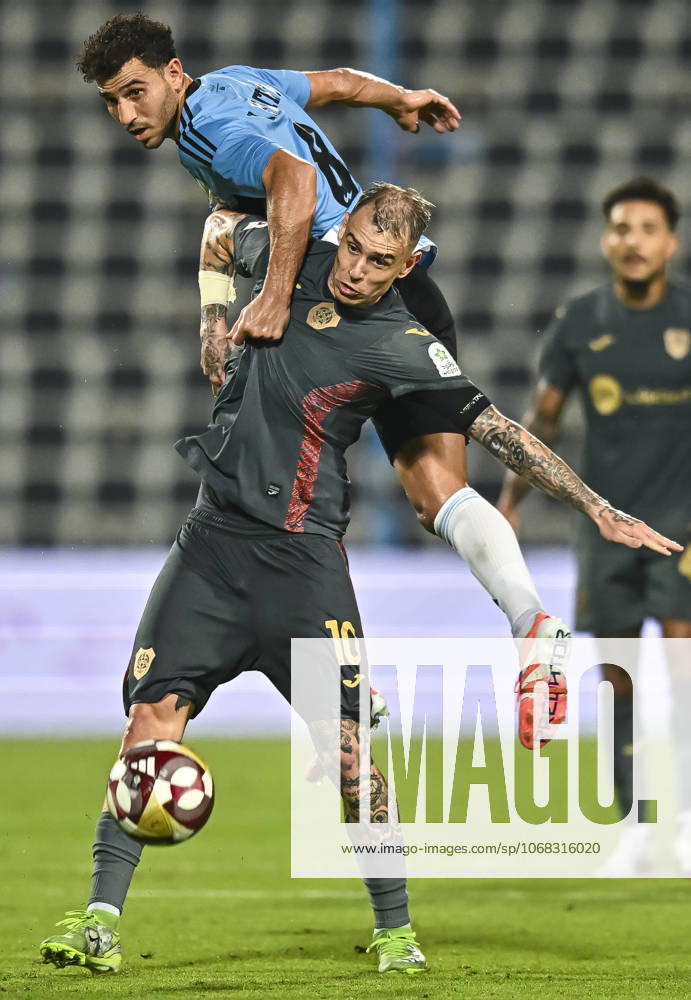 AL WAKRAH SC V AL RAYYAN SC-DOHA BANK STARS LEAGUE QATAR Hamdy Fathy Abdel Fattah (R) of Al-Wakrah SC and Roger Krug Guedes of Al Rayyan SC in action during the Doha Bank Stars League Qatar match between Al Wakrah SC and Al Rayyan SC at Saoud Bin Abdulrahman Stadium in Doha, Qatar, on October 26, 2025. DOHA Qatar