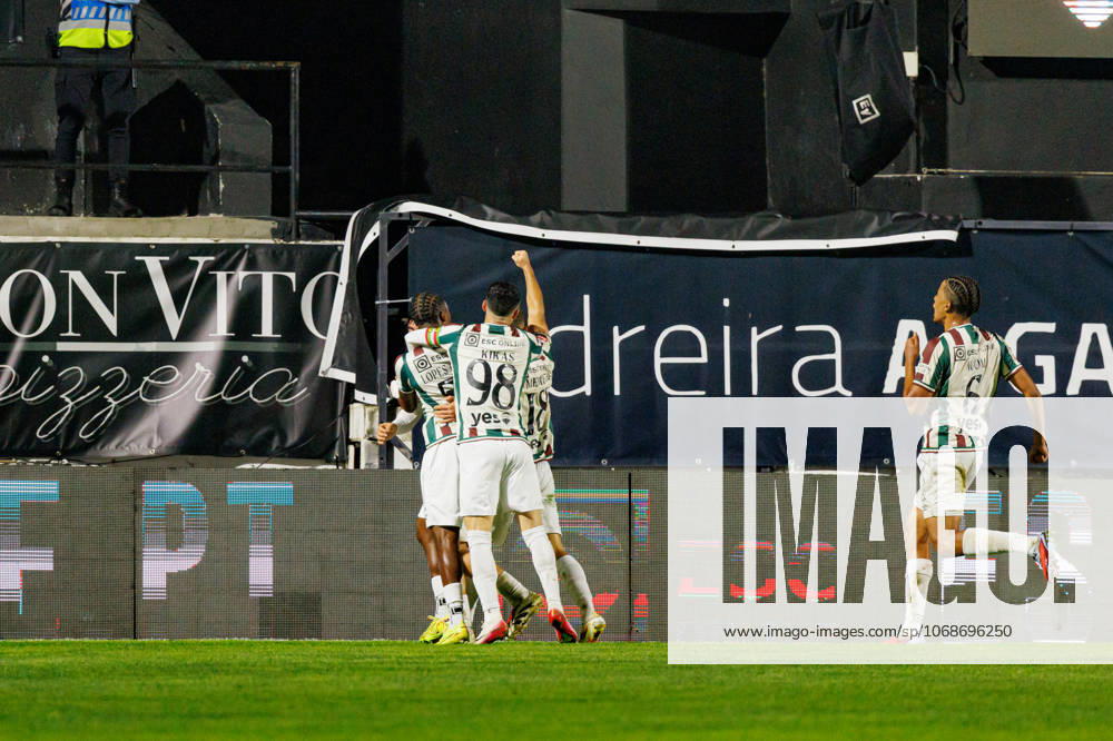 Players of Estrela seen celebrating after scoring goal during Liga Portugal game between teams of CF Estrela Amadora and Rio Ave FC at Estadio Jose Gomes (Maciej Rogowski Ball Raw Images) Amadora Estadio Jose Gomes Portugal