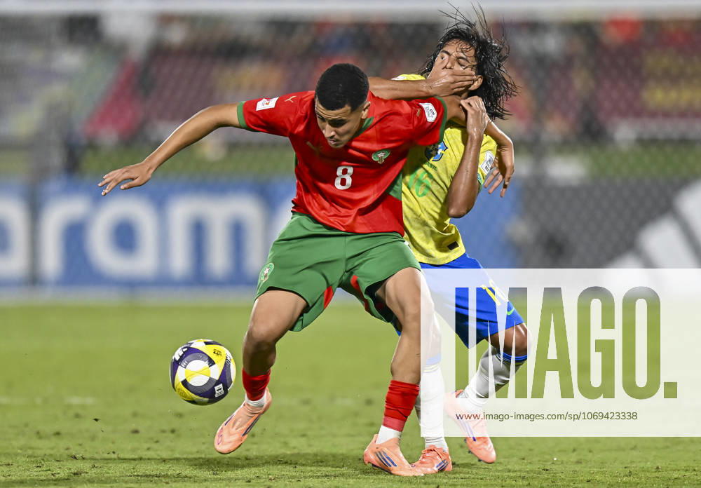 Morocco v Brazil : Quarter-final- FIFA U-17 World Cup Qatar 2025 Arthur Ryan (L) of Brazil and Abdellah Ouazane of Morocco in action during the FIFA U-17 World Cup Qatar 2025 Quarter-final match between Morocco and Brazil in Doha, Qatar, on November 21, 2025. DOHA Qatar