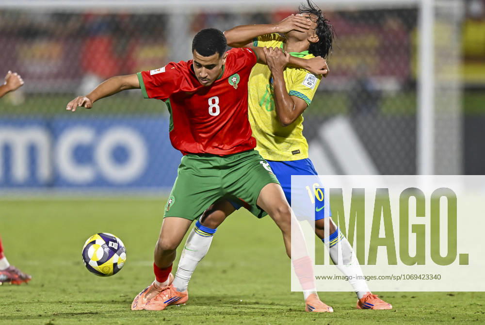 Morocco v Brazil : Quarter-final- FIFA U-17 World Cup Qatar 2025 Arthur Ryan (L) of Brazil and Abdellah Ouazane of Morocco in action during the FIFA U-17 World Cup Qatar 2025 Quarter-final match between Morocco and Brazil in Doha, Qatar, on November 21, 2025. DOHA Qatar