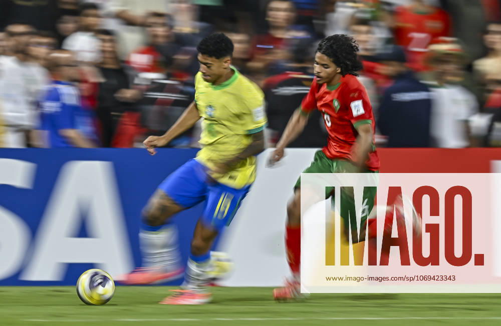Morocco v Brazil : Quarter-final- FIFA U-17 World Cup Qatar 2025 Luis Pacheco (L) of Brazil and Abdellah Ouazane of Morocco in action during the FIFA U-17 World Cup Qatar 2025 Quarter-final match between Morocco and Brazil in Doha, Qatar, on November 21, 2025. DOHA Qatar