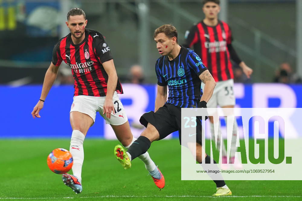 Inter Milans Nicolo Barella fights for the ball AC Milan s Adrien Rabiot during the Serie A soccer match between Inter and Milan at the San Siro Stadium in Milan , north Italy - Sunday , November 23 , 2025. - Soccer .