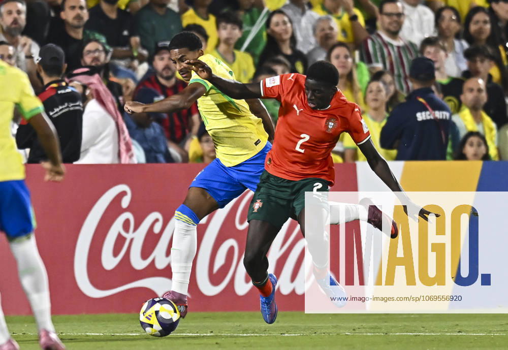 Portugal v Brazil : Semi-final- FIFA U-17 World Cup Qatar 2025 Daniel Banjaqui of Portugal and Kayke of Brazil in action during the FIFA U-17 World Cup Qatar 2025 Semi-final match between Portugal and Brazil in Doha, Qatar, on November 24, 2025. DOHA Qatar