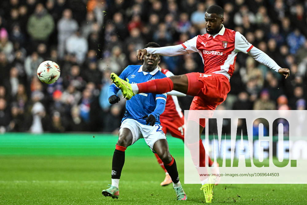 Rangers v S.C. Braga UEFA Europa League Djeidi Gassama of Rangers as Sikou Niakate of S.C. Braga clears the ball during the UEFA Europa League match at Ibrox Stadium, Glasgow UK Newspapers OUT