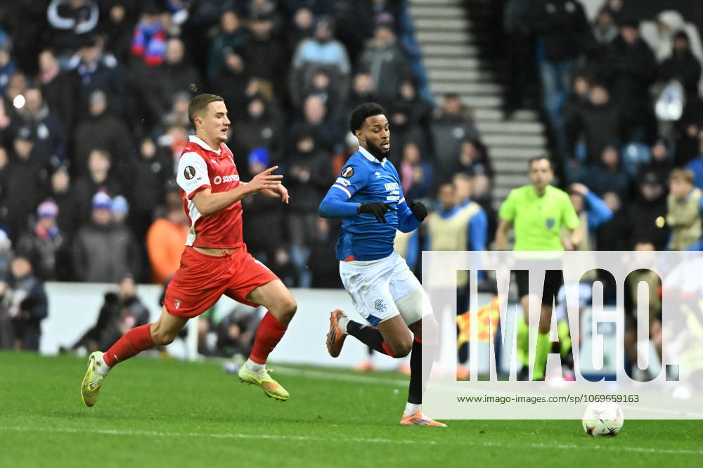 Rangers v S.C. Braga UEFA Europa League Youssef Chermiti of Rangers is tackled by Gustaf Lagerbielke of S.C. Braga during the UEFA Europa League match at Ibrox Stadium, Glasgow UK Newspapers OUT