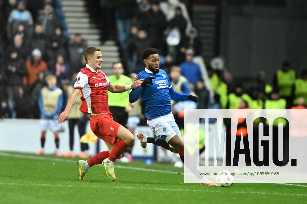 Rangers v S.C. Braga UEFA Europa League Youssef Chermiti of Rangers is tackled by Gustaf Lagerbielke of S.C. Braga during the UEFA Europa League match at Ibrox Stadium, Glasgow UK Newspapers OUT