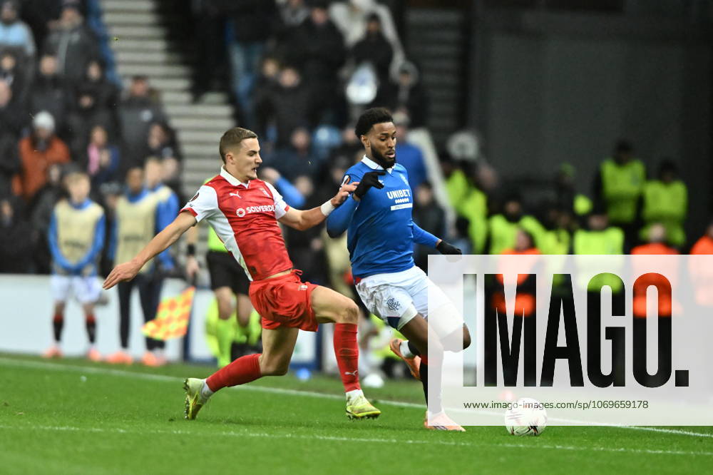 Rangers v S.C. Braga UEFA Europa League Youssef Chermiti of Rangers is tackled by Gustaf Lagerbielke of S.C. Braga during the UEFA Europa League match at Ibrox Stadium, Glasgow UK Newspapers OUT