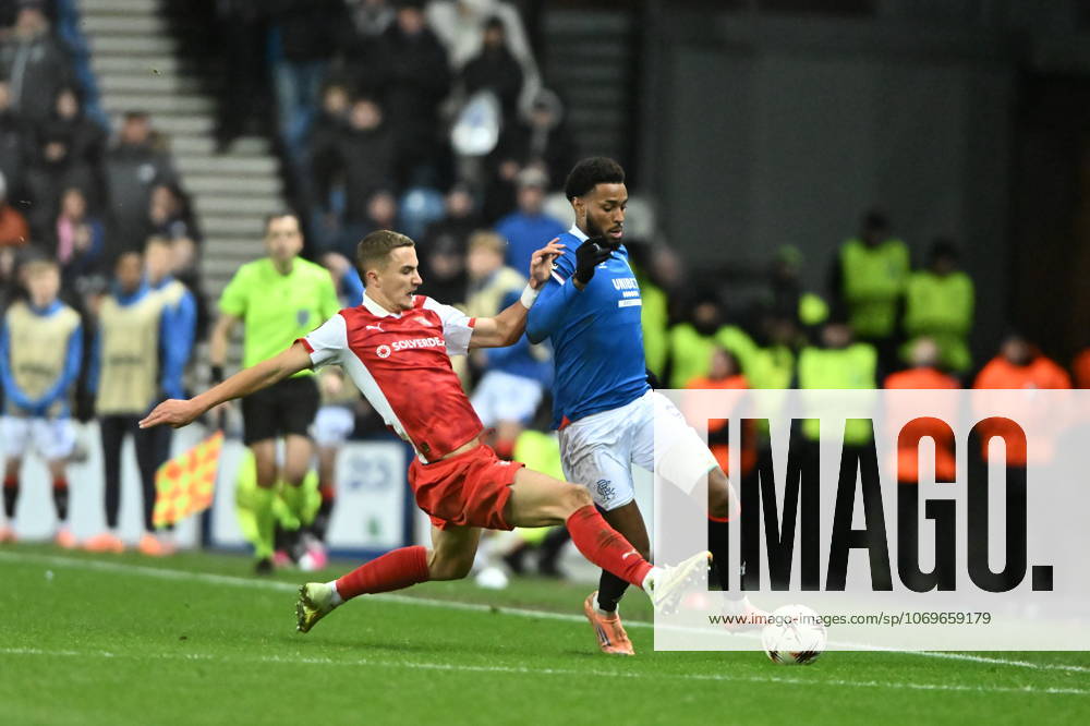 Rangers v S.C. Braga UEFA Europa League Youssef Chermiti of Rangers is tackled by Gustaf Lagerbielke of S.C. Braga during the UEFA Europa League match at Ibrox Stadium, Glasgow UK Newspapers OUT
