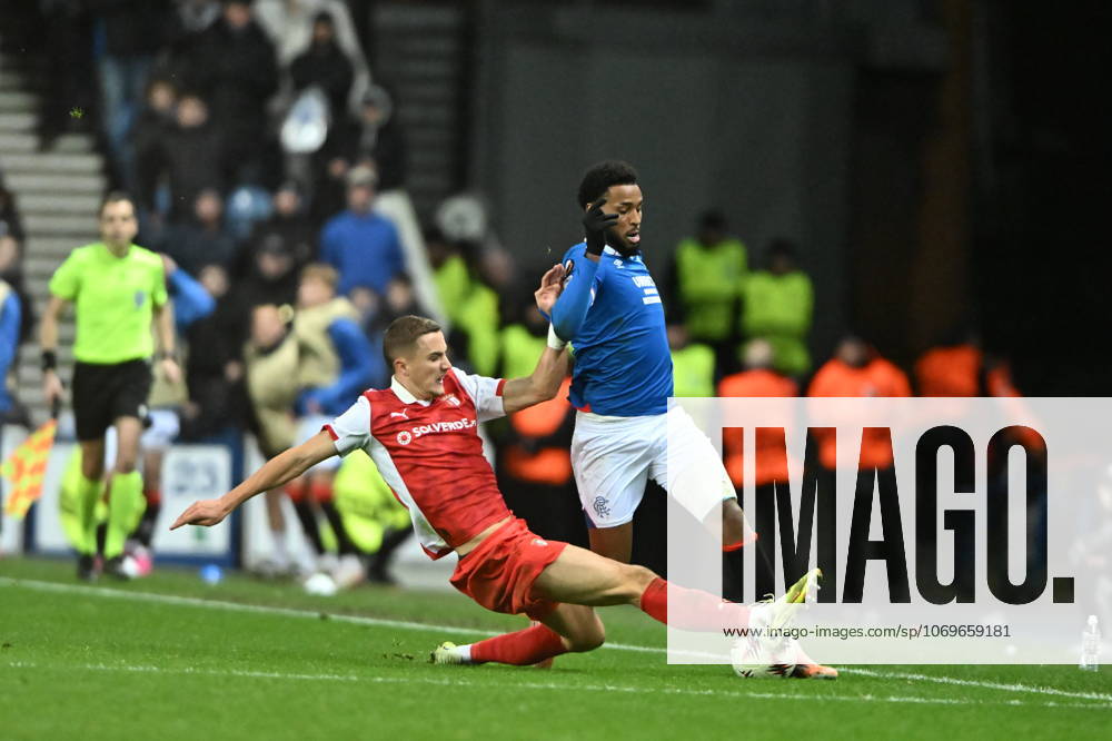 Rangers v S.C. Braga UEFA Europa League Youssef Chermiti of Rangers is tackled by Gustaf Lagerbielke of S.C. Braga during the UEFA Europa League match at Ibrox Stadium, Glasgow UK Newspapers OUT