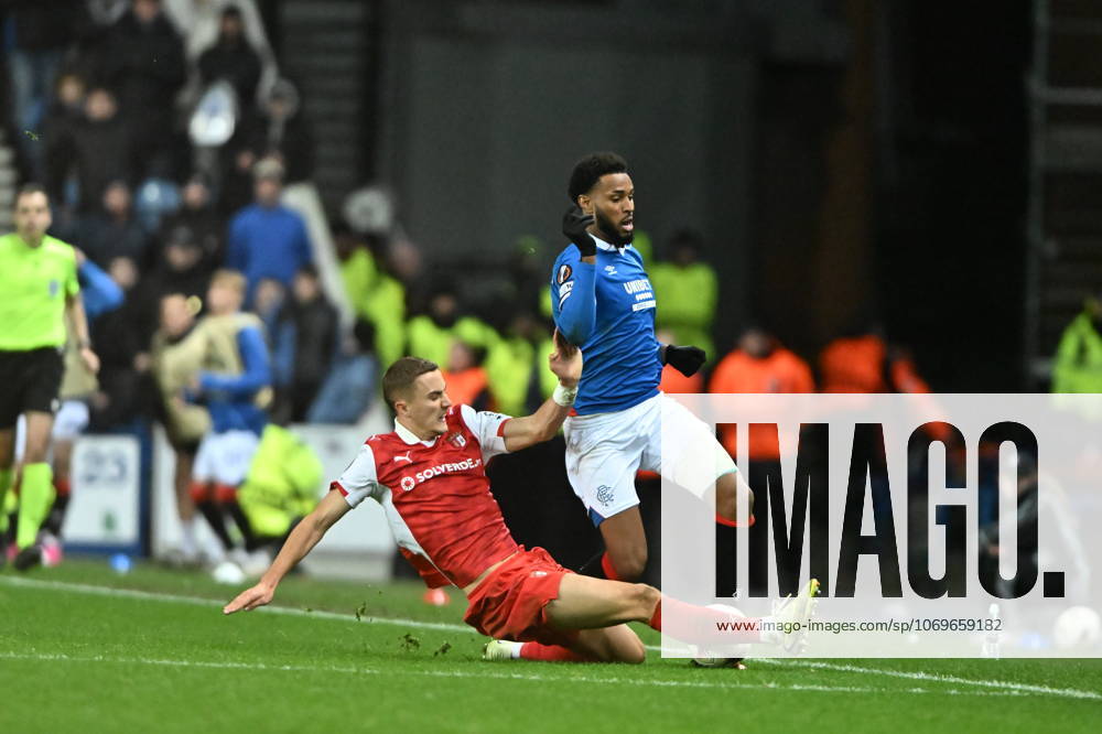 Rangers v S.C. Braga UEFA Europa League Youssef Chermiti of Rangers is tackled by Gustaf Lagerbielke of S.C. Braga during the UEFA Europa League match at Ibrox Stadium, Glasgow UK Newspapers OUT