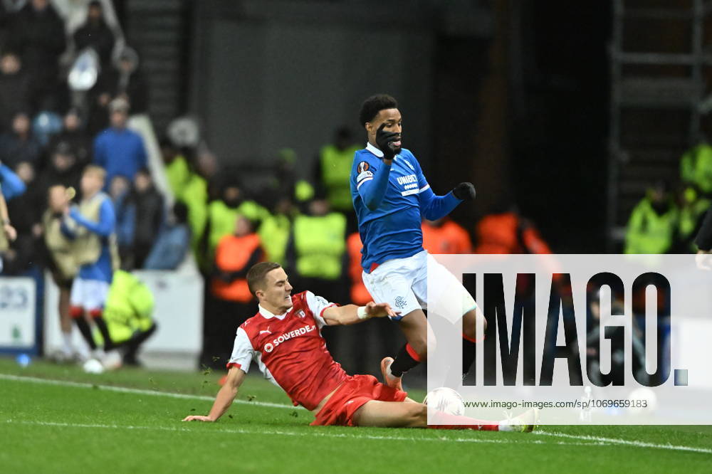 Rangers v S.C. Braga UEFA Europa League Youssef Chermiti of Rangers is tackled by Gustaf Lagerbielke of S.C. Braga during the UEFA Europa League match at Ibrox Stadium, Glasgow UK Newspapers OUT