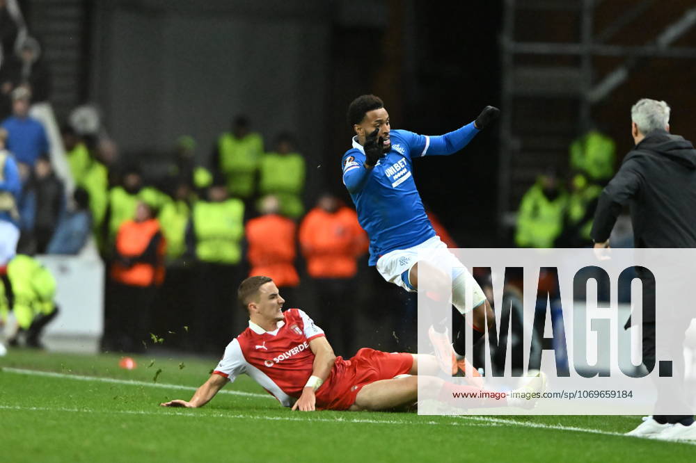 Rangers v S.C. Braga UEFA Europa League Youssef Chermiti of Rangers is tackled by Gustaf Lagerbielke of S.C. Braga during the UEFA Europa League match at Ibrox Stadium, Glasgow UK Newspapers OUT