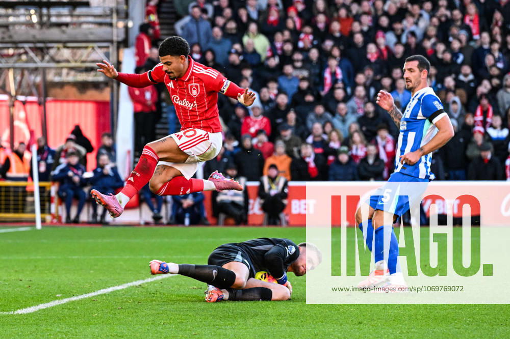 30th November 2025; The City Ground, Nottingham, England; Premier League Football, Nottingham Forest versus Brighton and Hove Albion; Bart Verbruggen of Brighton claims the ball at the feet of Morgan Gibbs-White of Nottingham Forest as Lewis Dunk of Brighton watches on GodfreyxPitt