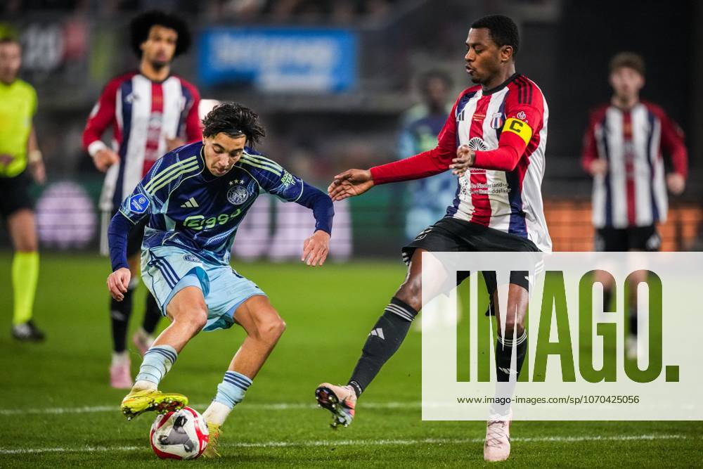 , Sparta stadium ˜Het Kasteel , season 2025 2026 , Dutch KNVB Beker football , match between Excelsior Maasluis and Ajax , picture shows Ajax player Rayane Bounida and Excelsior Maassluis player Kevin Ringeling Excelsior Maassluis - Ajax (cup) x200248973x