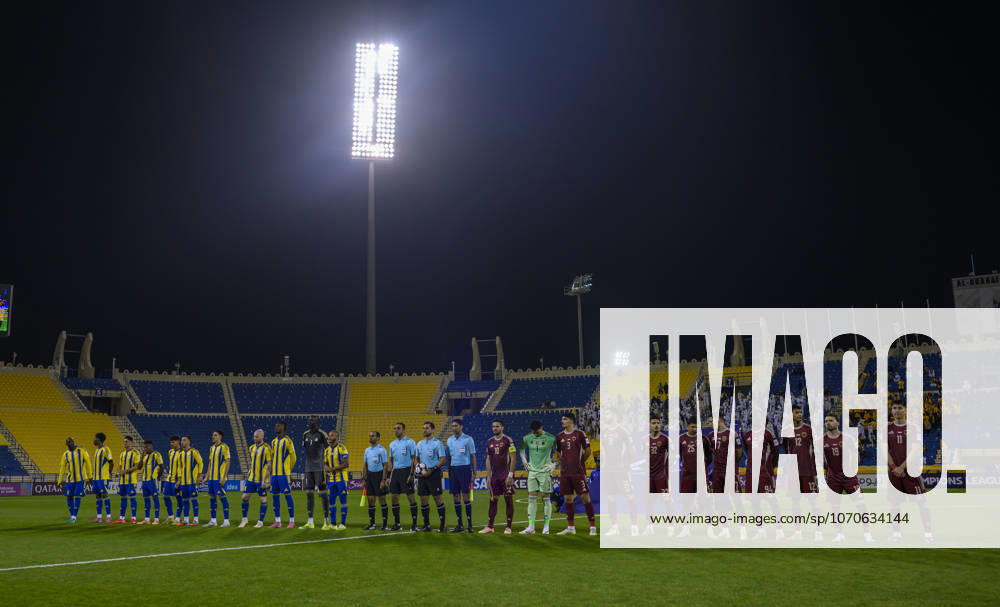AFC CHAMPIONS LEAGUE ELITE, AL GHARAFA SC V AL WAHDA FC Players and referees line up prior to the AFC Champions League elite west football match between Qatar s Al Gharafa SC and United Arab Emirates Al Wahda FC at Thani Bin Jassim Stadium in Doha, Qatar on December 22, 2025. DOHA Qatar