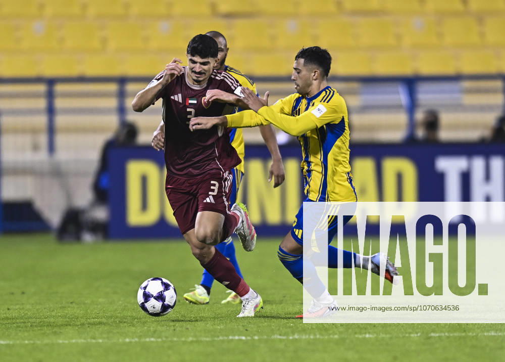 AFC CHAMPIONS LEAGUE ELITE, AL GHARAFA SC V AL WAHDA FC Fabricio Diaz Badaracco (L) of Al Gharafa SC and Lucas Pimenta of Al Wahda FC in action during the AFC Champions League elite west football match between Qatar s Al Gharafa SC and United Arab Emirates Al Wahda FC at Thani Bin Jassim Stadium in Doha, Qatar on December 22, 2025. DOHA Qatar