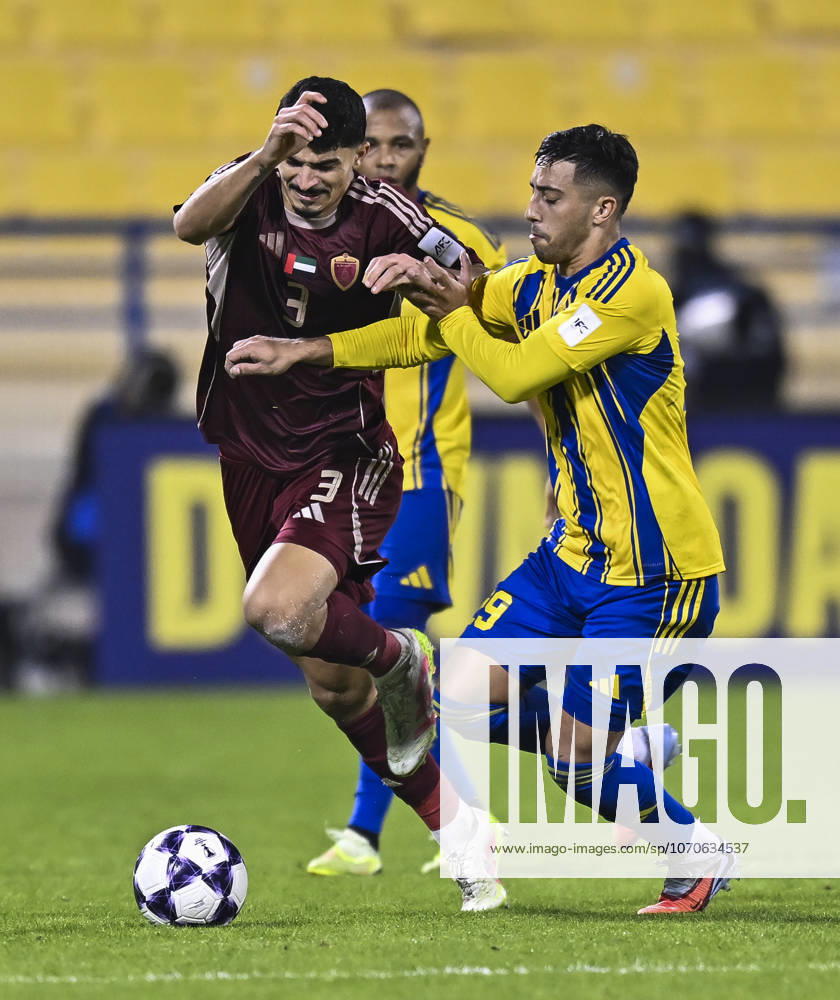 AFC CHAMPIONS LEAGUE ELITE, AL GHARAFA SC V AL WAHDA FC Fabricio Diaz Badaracco (L) of Al Gharafa SC and Lucas Pimenta of Al Wahda FC in action during the AFC Champions League elite west football match between Qatar s Al Gharafa SC and United Arab Emirates Al Wahda FC at Thani Bin Jassim Stadium in Doha, Qatar on December 22, 2025. DOHA Qatar