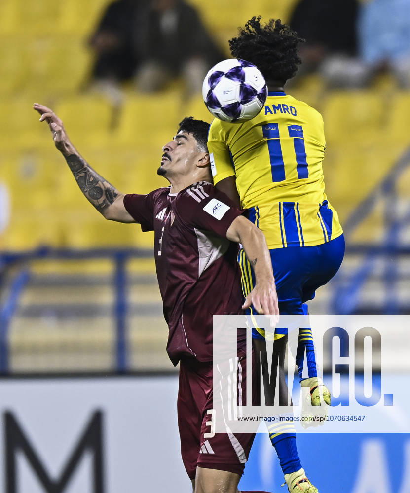 AFC CHAMPIONS LEAGUE ELITE, AL GHARAFA SC V AL WAHDA FC Amro Surag (R) of Al Gharafa SC and Lucas Pimenta of Al Wahda FC in action during the AFC Champions League elite west football match between Qatar s Al Gharafa SC and United Arab Emirates Al Wahda FC at Thani Bin Jassim Stadium in Doha, Qatar on December 22, 2025. DOHA Qatar