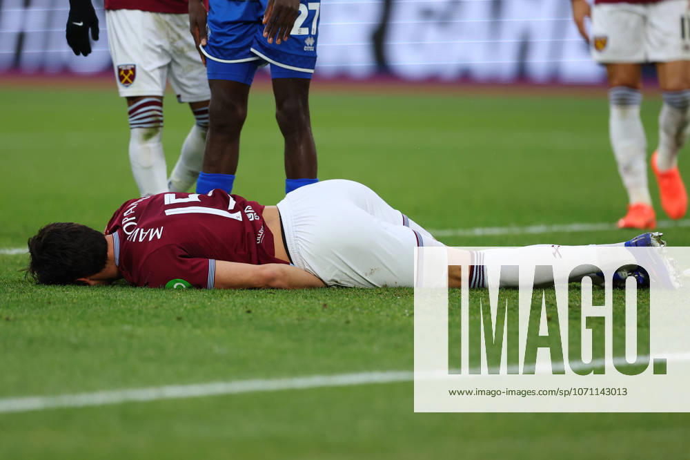 11th January 2026; London Stadium, London, England; FA Cup Football, West Ham United versus Queens Park Rangers; Konstantinos Mavropanos of West Ham United lying on the pitch severely injuring this neck during a West Ham United cross JohnxPatrickxFletcher