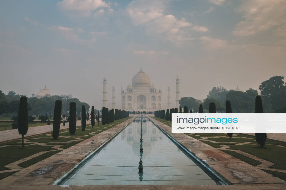 Taj Mahal reflection at sunrise as seen from Char Bagh pool, Agra, India Agra, UP, India CR_JALO201130-571732-01
