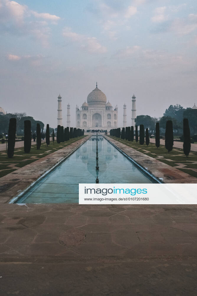 Taj Mahal reflection at sunrise as seen from Char Bagh pool, Agra, India Agra, UP, India CR_JALO201130-571734-01