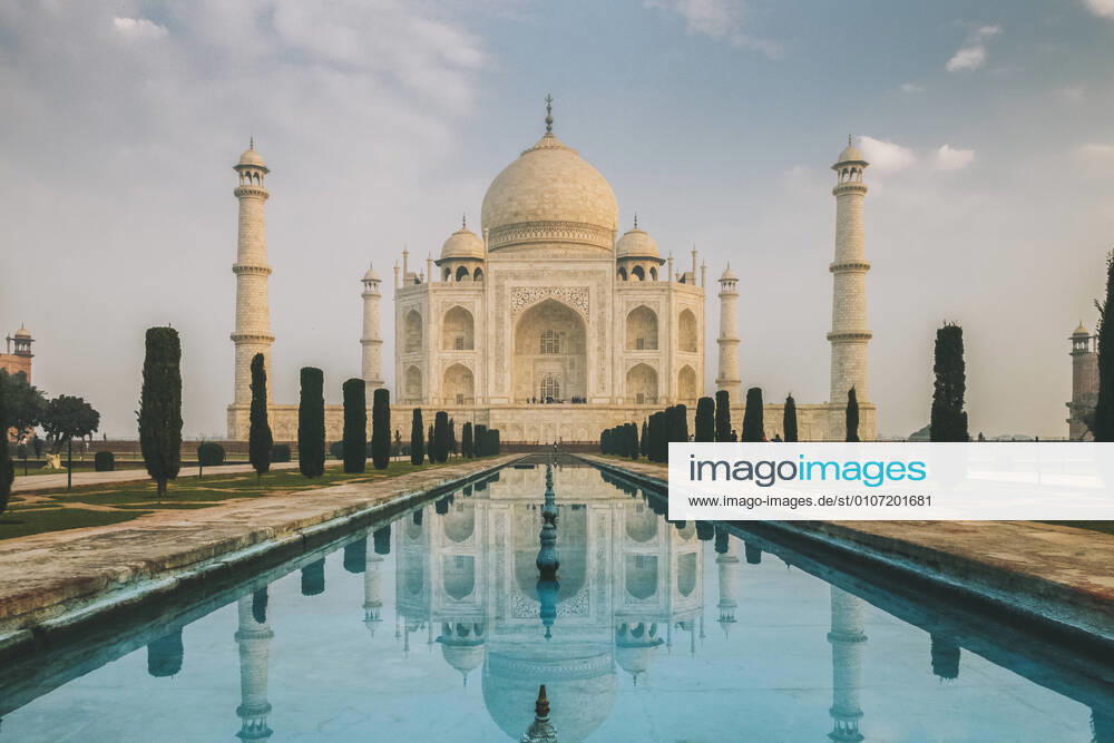 Taj Mahal reflection at sunrise as seen from Char Bagh pool, Agra, India Agra, UP, India CR_JALO201130-571735-01