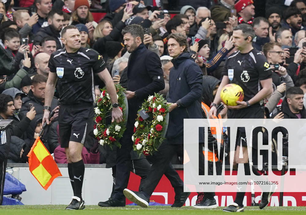 Manchester, England, 7th February 2026. Michael Carrick head coach of Manchester United, ManU and Thomas Frank coach of Tottenham carry wreaths in memory of the Busby Babes before the Manchester United vs Tottenham Hotspur Premier League match at Old Trafford, Manchester. Picture credit should read: Andrew Yates Sportimage . SPI_031_AY_Man_Utd_Spurs SPI-4511-0031