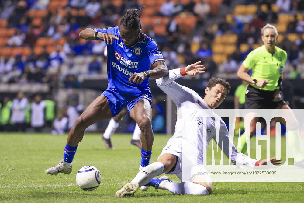 CONCACAF CHAMPIONS CUP 2026 CONCACAF CHAMPIONS CUP 2026 CRUZ AZUL VS VANCOUVER 12022026 PUEBLA, PUEBLA. Action photo of Christian Ebere (L) of Cruz Azul of the Liga BBVA MX, and a defender (R) of the Vancouver FC of the Canadian Premier League, during round 1 game of the CONCACAF Champions Cup 2026 at the Estadio Cuauhtemoc of Puebla, Mexico. Foto de accion de Christian Ebere (I) de Cruz Azul de la Liga BBVA MX y un defensor (D) del Vancouver FC de la Liga Premier Canadiense, durante juego de la ronda 1 de la CONCACAF Champions Cup 2026, celebrado en el Estadio Cuauhtemoc de Puebla, Mexico. Photo by IMAGENSHOP AGENCIA FOTOGRAFICA PUEBLA PUEBLA MEXICO
