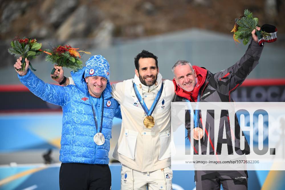 Hurajt (Pavol) - slo) - Fourcade (Martin) - (fra) - Sumann (Christoph) - (aut) - BIATHLON JO MILAN CORTINA 2026 2026 POURSUITE 12.5 KM HOMMES BIATHLON ARENA ANTHOLZ ANTERSELVA ITALIE 15 02 2026 GARNIER ETIENNE Suite à la disqualification pour dopage du Russe Evgeny Ustyugov, le podium de la mass-start des JO Vancouver 2010 a été réattribué. Le Francais Martin Fourcade hérite de l or, le Slovaque Pavol Hurajt de l argent et l Autrichien Christoph Sumann du bronze. ANTHOLZ ANTERSELVA BIATHLON ARENA Italie GermanyxJapanxUKxFrancexBelgiumxOUT