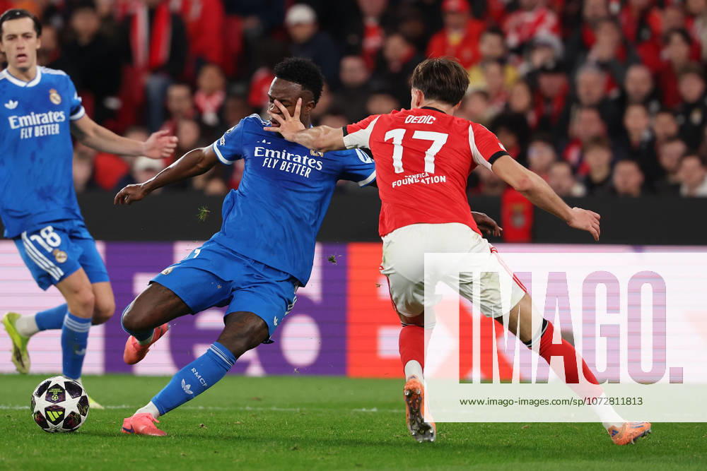 FBL-UEFA Champions League 2025-26 SL Benfica - Real Madrid Vinicius Junior (Real Madrid) in action, with the ball, Amar Dedic (S.L.Benfica) during UEFA Champions League 2025-26 KO play-offs match between Lisboa e Benfica and Real Madrid at Estadio da Luz on Thursday 17 February 2026 in Lisbon, Portugal