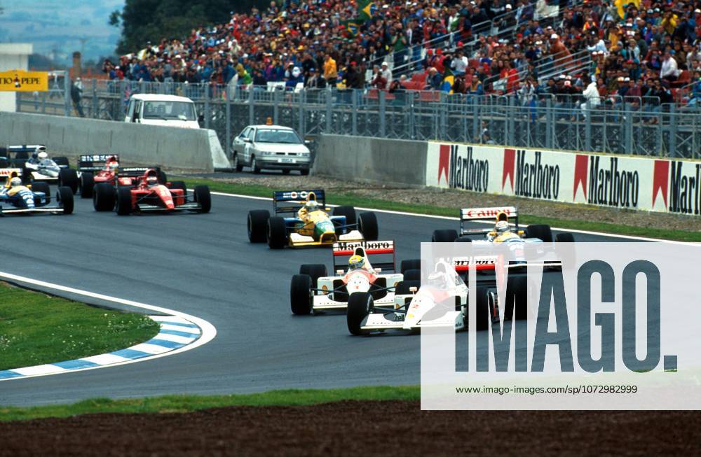 Gerhard Berger (AUT) McLaren MP4 6 led the field from pole into the first corner. Following him is team mate Ayrton Senna (BRA), then race winner Nigel Mansell (GBR) Williams FW14 and Michael Schumacher (GER) Benetton B191 Ã excelling in only his fourth grand prix. ..Spanish Grand Prix, Barcelona