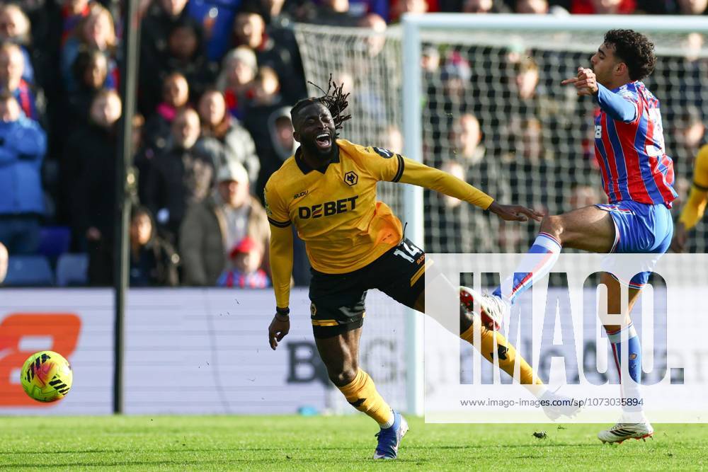 Tolu Arokodare of Wolverhampton Wanderers fouled by Chadi Riad of Crystal Palace Crystal Palace v Wolverhampton Wanderers, Premier League, Football, Selhurst Park, London, UK - 22 Feb 2026London Selhurst Park United Kingdom