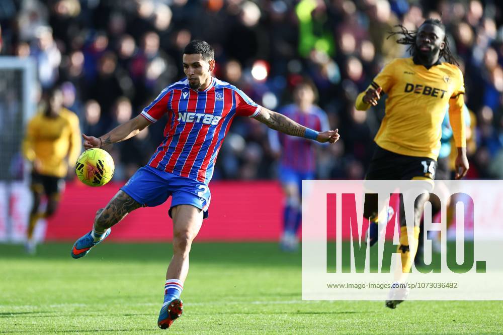Daniel Munoz of Crystal Palace chased by Tolu Arokodare of Wolverhampton Wanderers Crystal Palace v Wolverhampton Wanderers, Premier League, Football, Selhurst Park, London, UK - 22 Feb 2026London Selhurst Park United Kingdom