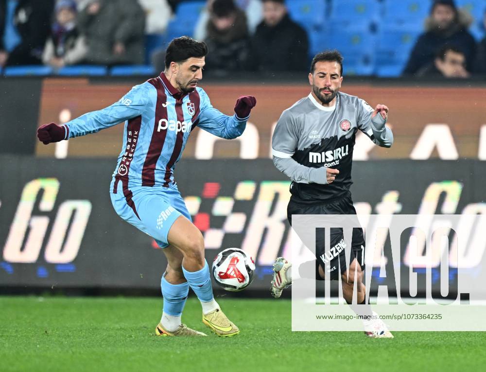 Trabzonspor v Misirli.com.tr Fatih Karagumruk - Turkish Super Lig TRABZON, TURKIYE - FEBRUARY 27: Ozan Tufan (L) of Trabzonspor in action against Filip Mladenovic of Fatih Karagumruk during Turkish Super Lig week 24 football match between Trabzonspor and Misirli.com.tr Fatih Karagumruk at Papara Park in Trabzon, Turkiye on February 27, 2026. Hakan Burak Altunoz Anadolu Trabzon Turkey. Editorial use only. Please get in touch for any other usage.