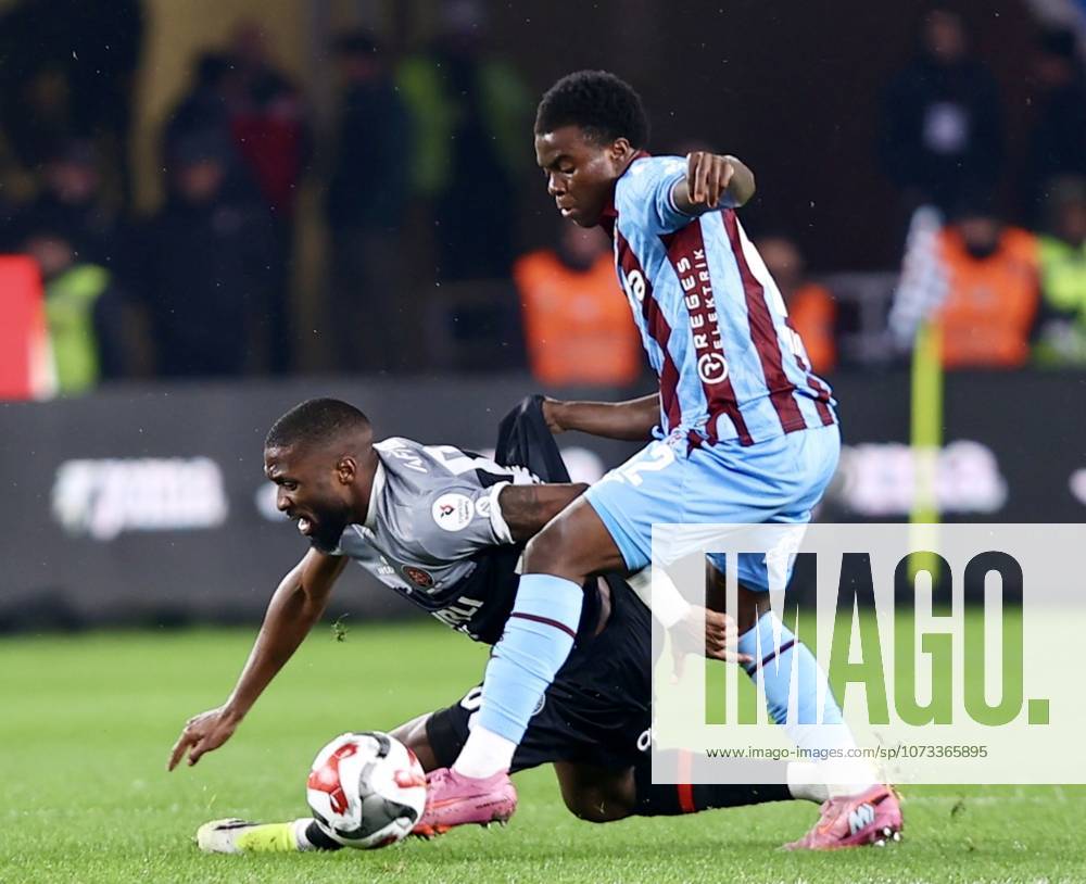 Trabzonspor v Misirli.com.tr Fatih Karagumruk - Turkish Super Lig TRABZON, TURKIYE - FEBRUARY 27: Oulai (R) of Trabzonspor in action against DanieleShavy Babicka of Fatih Karagumruk during Turkish Super Lig week 24 football match between Trabzonspor and Misirli.com.tr Fatih Karagumruk at Papara Park in Trabzon, Turkiye on February 27, 2026. Seyit Ahmet Eksik Anadolu Trabzon Turkey. Editorial use only. Please get in touch for any other usage.