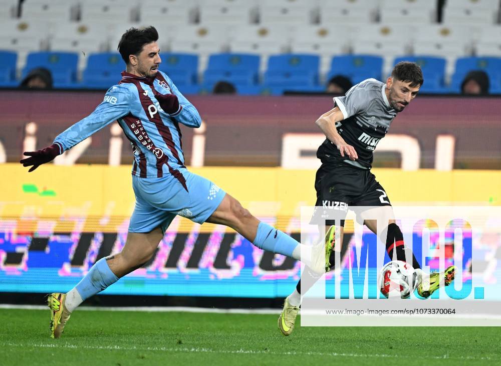 Trabzonspor v Misirli.com.tr Fatih Karagumruk - Turkish Super Lig TRABZON, TURKIYE - FEBRUARY 27: Ozan Tufan (L) of Trabzonspor in action against Filip Mladenovici of Fatih Karagumruk during Turkish Super Lig week 24 football match between Trabzonspor and Misirli.com.tr Fatih Karagumruk at Papara Park in Trabzon, Turkiye on February 27, 2026. Hakan Burak Altunoz Anadolu Trabzon Turkey. Editorial use only. Please get in touch for any other usage.