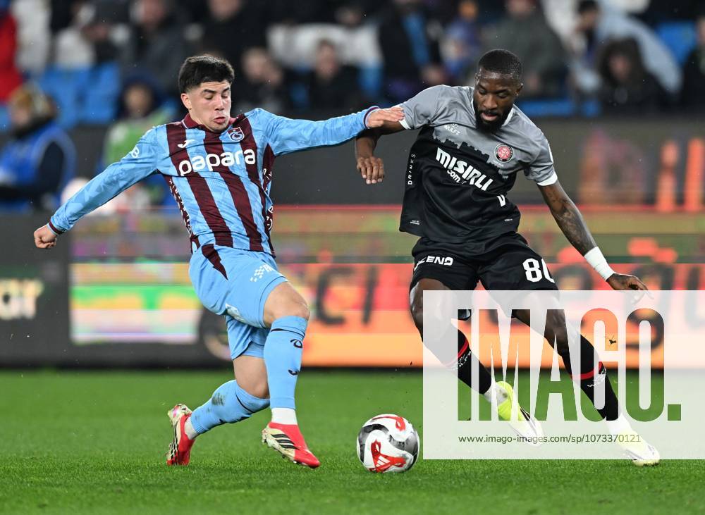 Trabzonspor v Misirli.com.tr Fatih Karagumruk - Turkish Super Lig TRABZON, TURKIYE - FEBRUARY 27: Benjamin Bouchouari (L) of Trabzonspor in action against Babicka of Fatih Karagumruk during Turkish Super Lig week 24 football match between Trabzonspor and Misirli.com.tr Fatih Karagumruk at Papara Park in Trabzon, Turkiye on February 27, 2026. Hakan Burak Altunoz Anadolu Trabzon Turkey. Editorial use only. Please get in touch for any other usage.