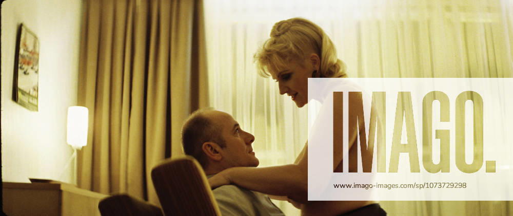 RELEASE DATE: February 9, 2007. MOVIE TITLE: Das Leben der Anderen (North America: The Lives of Others ) - STUDIO: Creado Film Sony Pictures Classics. PLOT: Captain Wiesler (Muhe) is a wiretapping expert with the Stasi (East German Secret Police) in the mid-eighties,who becomes disillusioned with his career and life in general in the former socialist republic when his latest assignment, Georg Dreyman (Koch), a playwright with views against the totalitarian state, starts to challenge his beliefs through his overheard conversations. PICTURED: ULRICH MUHE as Hauptmann Gerd Wiesler and a prostitute. Hollywood California USA