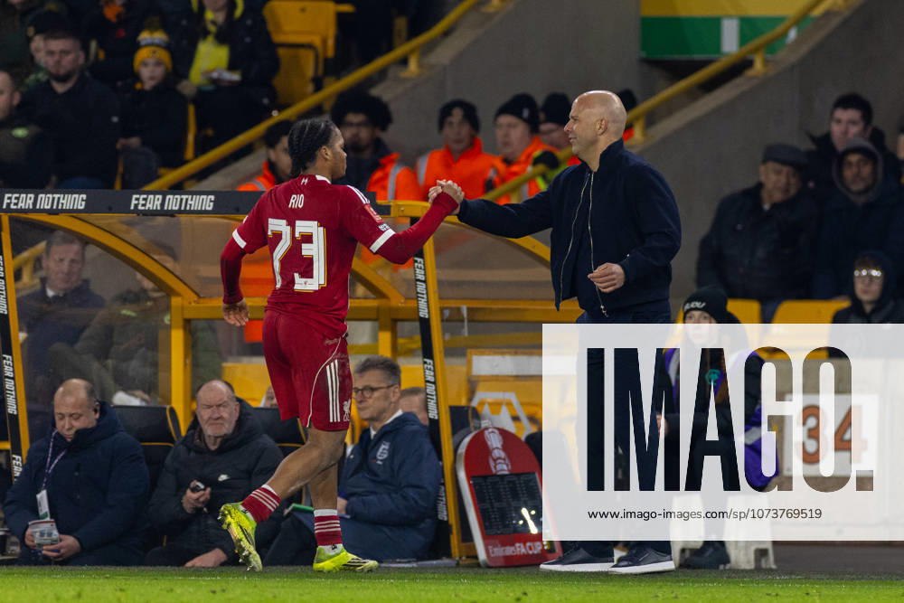 Football - FA Cup - 5th Round - Liverpool FC v Wolverhampton Wanderers FC WOLVERHAMPTON, ENGLAND - Friday, March 6, 2026: Liverpool s Rio Ngumoha is greeted by head coach Arne Slot as he is substituted off during the FA Cup 5th Round match between Liverpool FC and Wolverhampton Wanderers FC at Molineux. (Photo by David Rawcliffe Propaganda) WOLVERHAMPTON Molineux WEST MIDLANDS ENGLAND