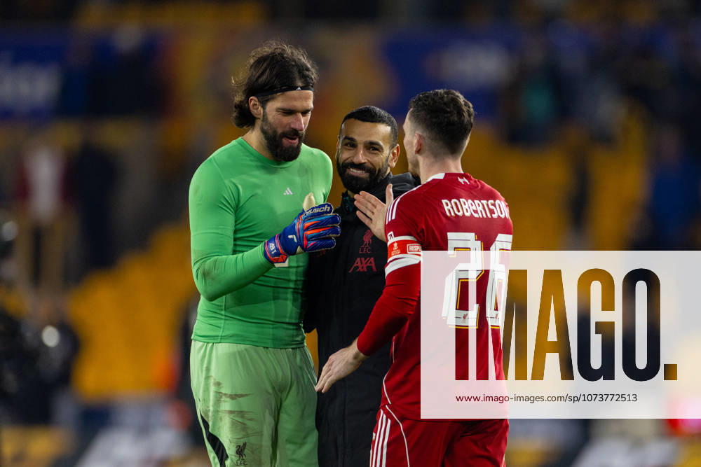 Football - FA Cup - 5th Round - Liverpool FC v Wolverhampton Wanderers FC WOLVERHAMPTON, ENGLAND - Friday, March 6, 2026: Liverpool s (L-R) goalkeeper Alisson Becker celebrate with goalscorers Mohamed Salah and Andy Robertson after the FA Cup 5th Round match between Liverpool FC and Wolverhampton Wanderers FC at Molineux. The game ended 1-3. (Photo by David Rawcliffe Propaganda) WOLVERHAMPTON Molineux WEST MIDLANDS ENGLAND